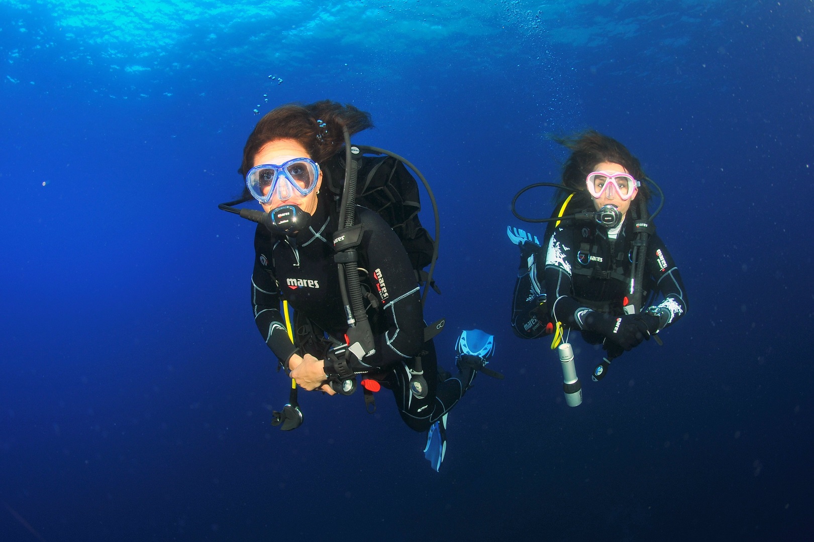 Female divers in the sea